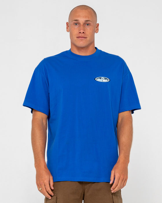 man-wearing-faden-short-sleeve-tee-in-royal-blue
