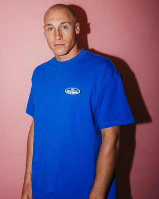 Man wearing Faden Short Sleeve Tee in Royal Blue