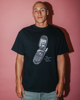 Man wearing Phone A Friend Short Sleeve Tee in Black