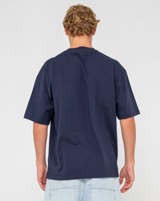 Man wearing Checkout Short Sleeve Tee in Navy Blue