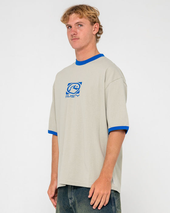 man-wearing-hyper-ringer-short-sleeve-tee-in-abbey-stone