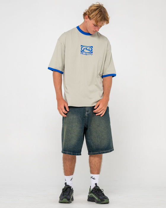 man-wearing-hyper-ringer-short-sleeve-tee-in-abbey-stone