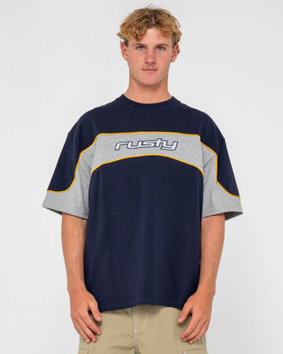 Man wearing Kinetic Short Sleeve Heavy Tee in Navy Blue