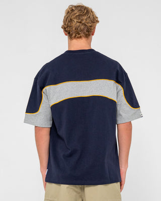 Man wearing Kinetic Short Sleeve Heavy Tee in Navy Blue