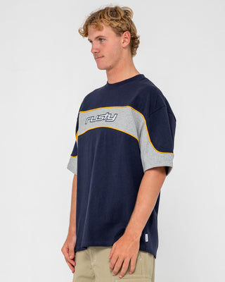 Man wearing Kinetic Short Sleeve Heavy Tee in Navy Blue