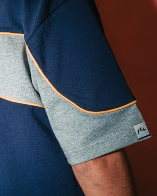 Man wearing Kinetic Short Sleeve Heavy Tee in Navy Blue