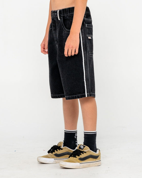 boy-wearing-flip-daddy-2-0-jort-black-out-boys-in-black-out