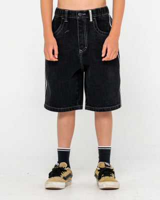 Boy wearing Flip Daddy 2.0 Jort- Black Out Boys in Black Out