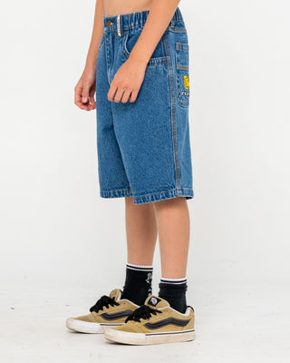 Boy wearing Flip Daddy Low Ballin Jort Boys in Middy Blue 1