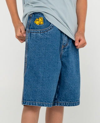 Boy wearing Flip Daddy Low Ballin Jort Boys in Middy Blue 1