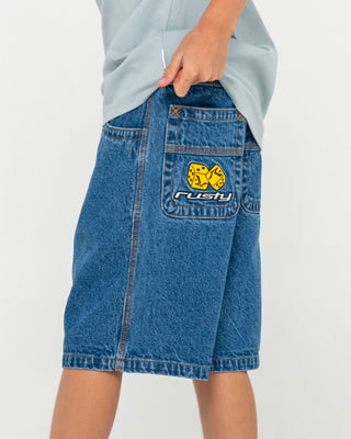 Boy wearing Flip Daddy Low Ballin Jort Boys in Middy Blue 1