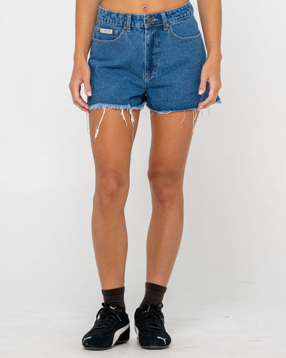 woman-wearing-penny-kick-flare-denim-short-in-middy-blue