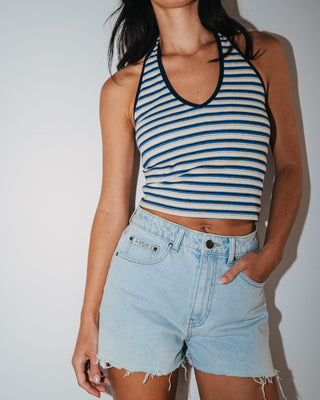 Woman wearing Penny Kick Flare Denim Short in Sky Blue Heather