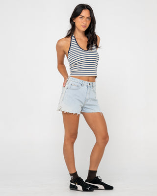 Woman wearing Penny Kick Flare Denim Short in Sky Blue Heather