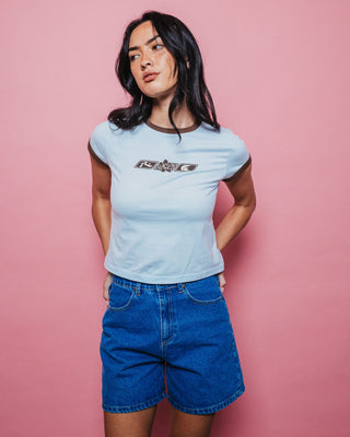 Woman wearing Cyprus High Denim Short in Middy Blue