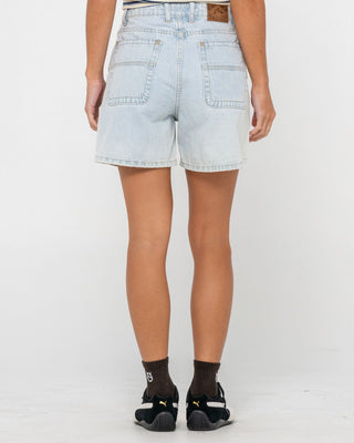 Woman wearing Cyprus High Denim Short in Sky Blue Heather