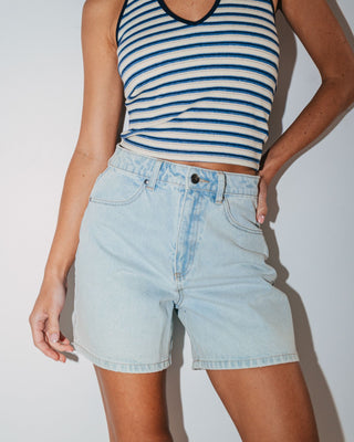 Woman wearing Cyprus High Denim Short in Sky Blue Heather