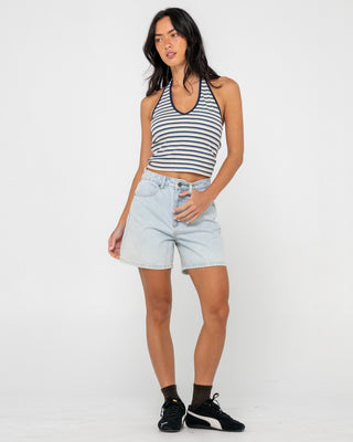 Woman wearing Cyprus High Denim Short in Sky Heather Blue
