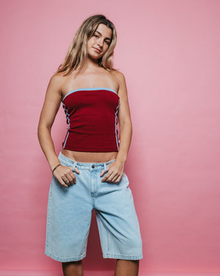 Woman wearing Bethany Baggy Low Rise Denim Jort in Sky Blue Heather