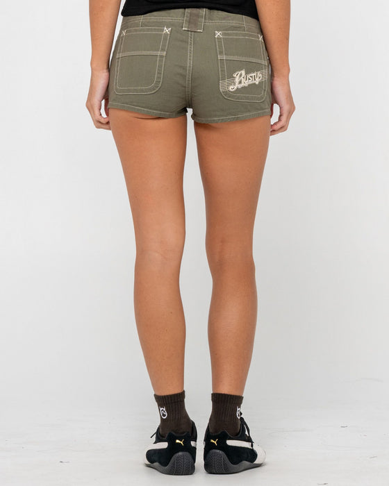 woman-wearing-dirtbag-cargo-low-rise-mini-short-in-light-khaki