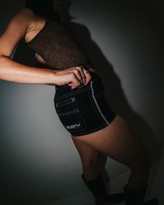 Woman wearing Flip Mommy Low Rise Micro Mini Short in Black Out / Grey