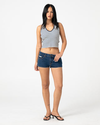 Woman wearing Lemmy Low Rise Micro Mini Short in Deep Sea Blue