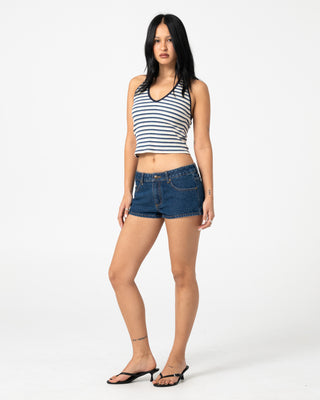 Woman wearing Lemmy Low Rise Micro Mini Short in Deep Sea Blue