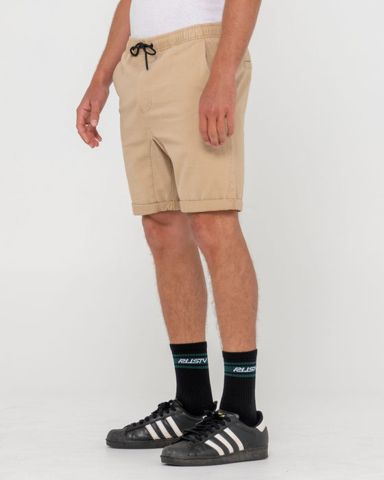 man-wearing-hooked-on-18-elastic-short-in-khaki