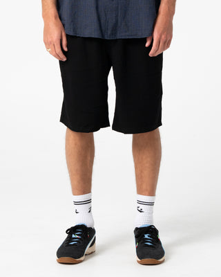 Man wearing Overtone Elastic Short in Black