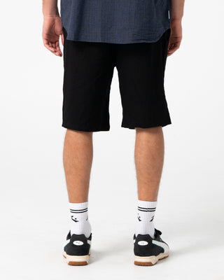 Man wearing Overtone Elastic Short in Black