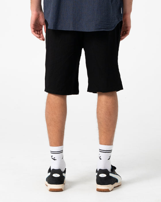 man-wearing-overtone-elastic-short-in-black