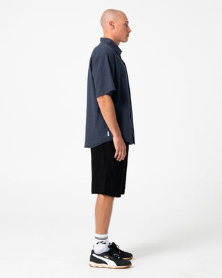 Man wearing Overtone Elastic Short in Black