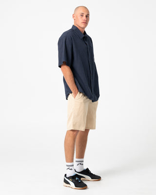 Man wearing Overtone Elastic Short in Light Fennel