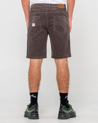 Man wearing Rifts 5 Pkt Short in Dark Choc