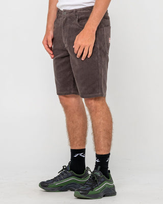 Man wearing Rifts 5 Pkt Short in Dark Choc