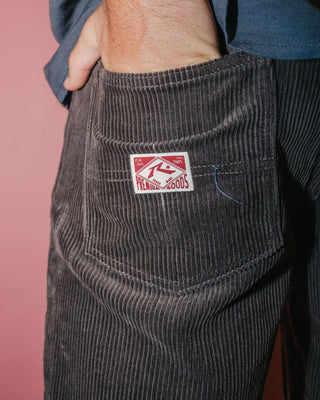 Man wearing Rifts 5 Pkt Short in Dark Choc