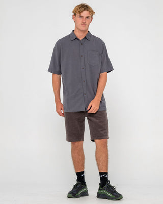 Man wearing Rifts 5 Pkt Short in Dark Choc