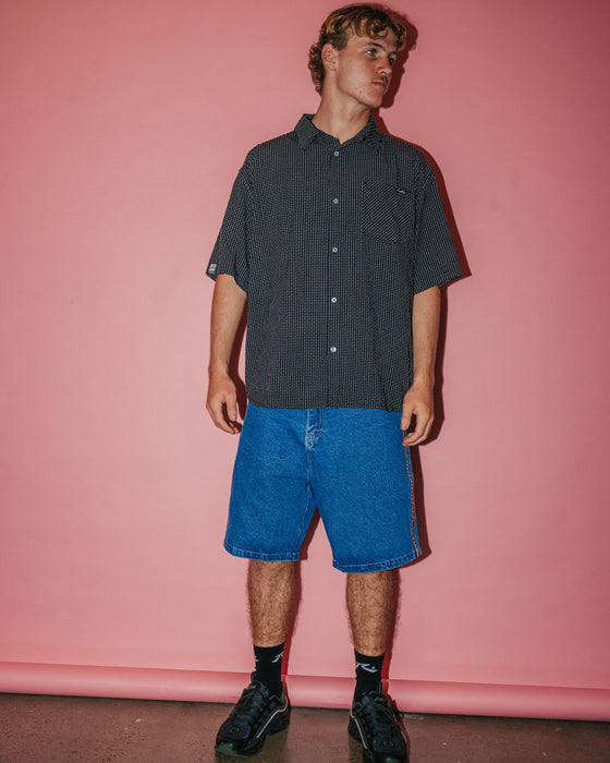 man-wearing-flip-daddy-2-0-jort-middy-blue-in-middy-blue