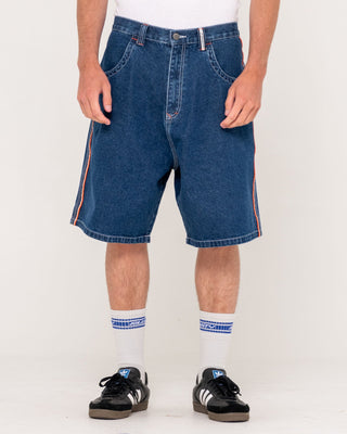 Man wearing Flip Daddy 2.0 Jort - Deep Sea Blue in Deep Sea Blue / Orange