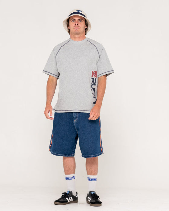 man-wearing-flip-daddy-2-0-jort-deep-sea-blue-in-deep-sea-blue-orange