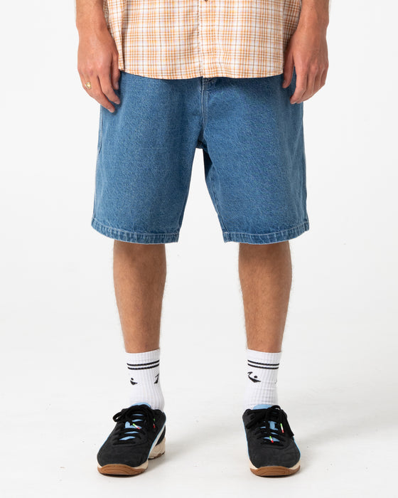 man-wearing-flip-daddy-tapeless-jort-middy-blue-in-middy-blue