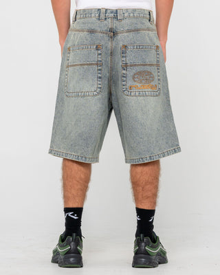 Man wearing Flip Daddy Life Cycle Jort in Dirty Dawg