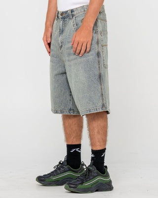 Man wearing Flip Daddy Life Cycle Jort in Dirty Dawg