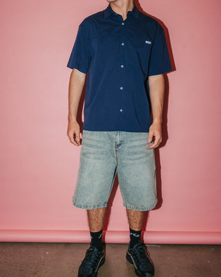 Man wearing Flip Daddy Life Cycle Jort in Dirty Dawg