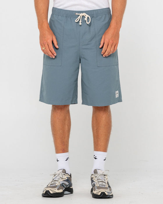 man-wearing-vapor-elastic-short-in-china-blue