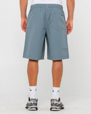 Man wearing Vapor Elastic Short in China Blue