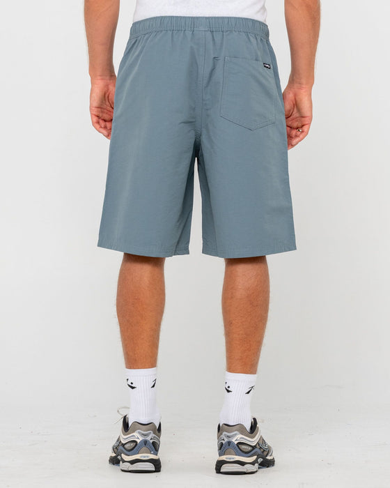 man-wearing-vapor-elastic-short-in-china-blue