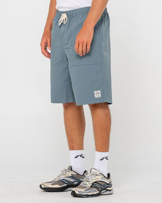 Man wearing Vapor Elastic Short in China Blue