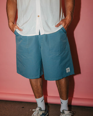 Man wearing Vapor Elastic Short in China Blue