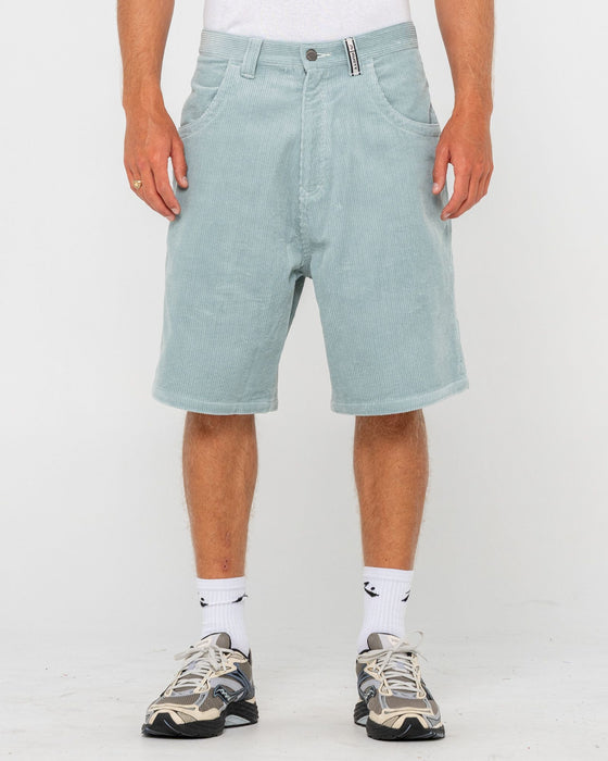 man-wearing-flip-daddy-tapeless-cord-short-in-smoke-blue